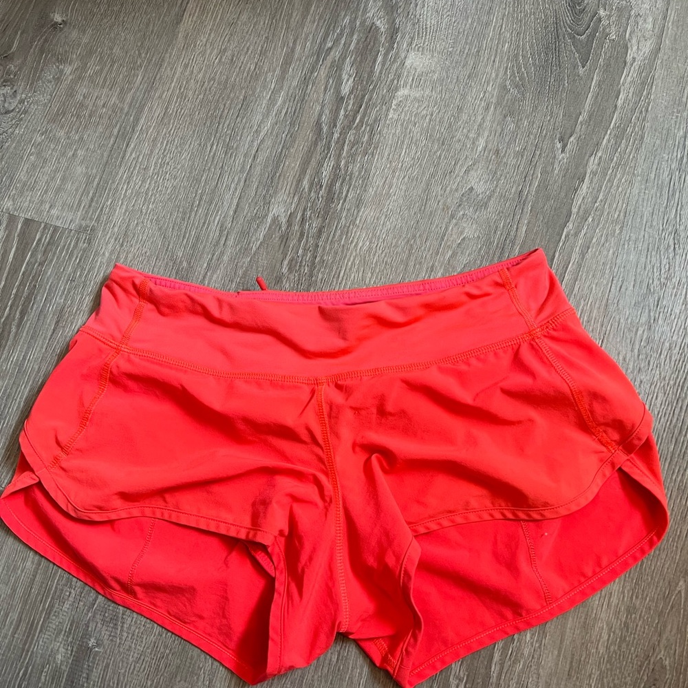 Neon salmon Lululemon shorts